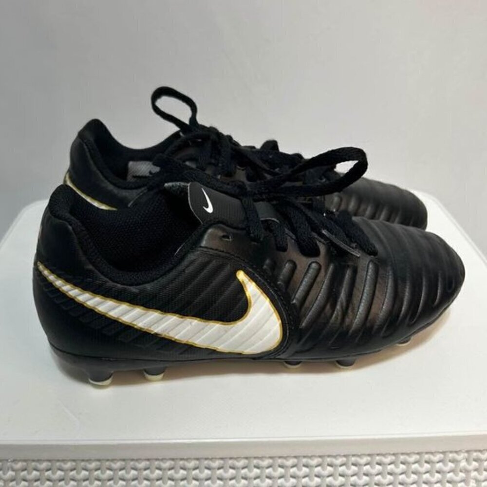 Nike Tiempo soccer cleats. Black and white. Size youth 1. Unisex. “Outdoor”